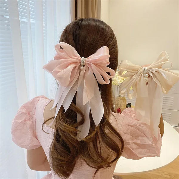 Multilayer statement bow with pearl drop