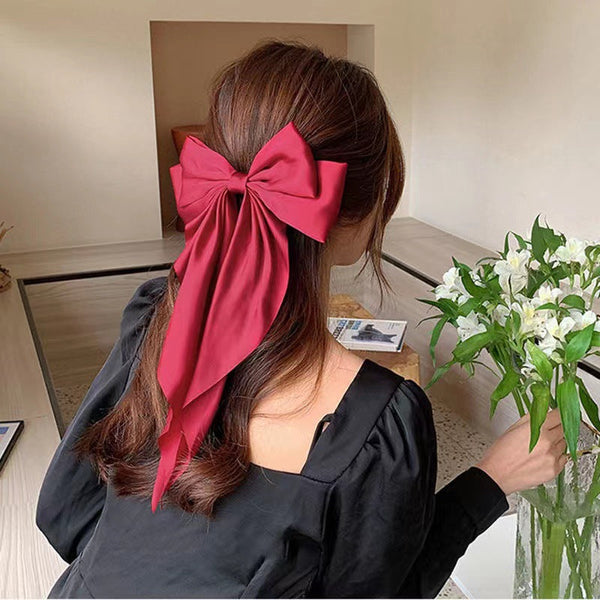 large statement satin bow buckle
