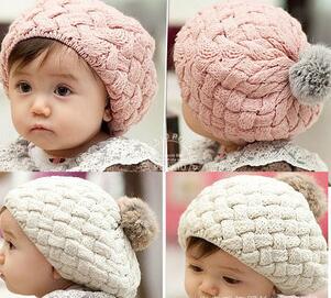 Thick woollen beret cap with pompom