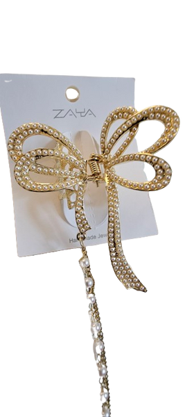 Pearl bow clutcher