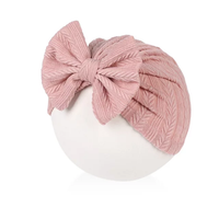 textured turban with large knot bow