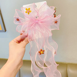 Organza fascinator bow with flowers