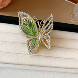 rhynestone lined flying butterfly medium metal clutcher