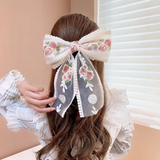 Vintage embroidered pastel bow