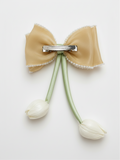 Medium fascinator tulip bow with beads lining