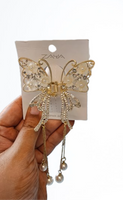 Butterfly clutcher with flower detail and hangings