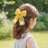 Crochet net bow with flowers
