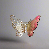 Small enamel butterfly clutcher
