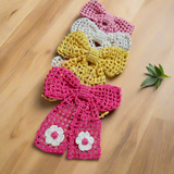 Crochet net bow with flowers