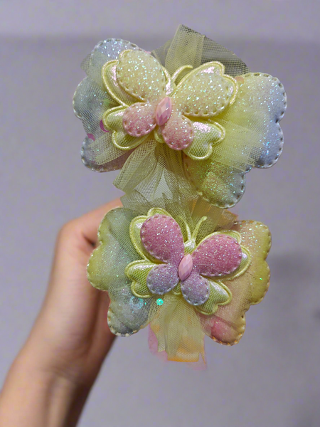 Pair of glitter butterfly bow hairclips