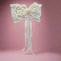 Pearly Bow fascinator hairclip with trail