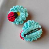 Pair of Crochet ladybug on flowers hairclip