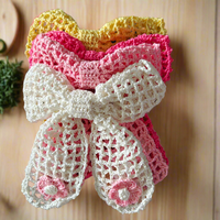 Crochet net bow with flowers