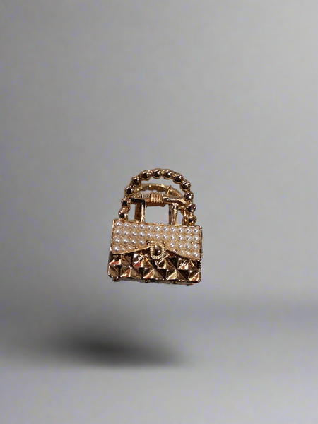 Small handbag clutcher clip