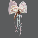 Pearly Bow fascinator hairclip with trail