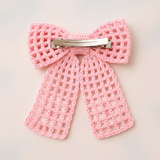 Crochet net bow with flowers