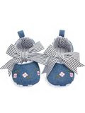 pretmybaby blue baby bellies with pink floral embroidery and a decorative blue and white striped bow