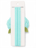 pretmybaby pastel blue flower baby headband with green lace leaves on a display card