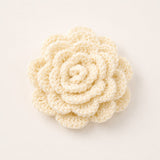 pretmybaby cream crochet rose hair accessory with layered petals, handcrafted from soft yarn for an elegant look.