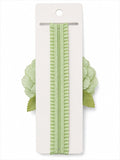 pretmybaby pastel green baby headband featuring a layered fabric flower and delicate lace leaves for infants