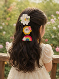 pretmybaby set of 3 handmade crochet hairclips featuring flower, sun, and rainbow designs worn by a young girl