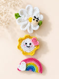 pretmybaby set of 3 handmade crochet hairclips featuring a white daisy, yellow sun, and colorful rainbow designs.