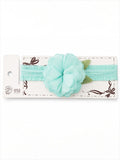 pretmybaby pastel mint green baby headband featuring a layered fabric flower and delicate lace leaves