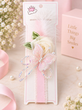 pretmybaby pastel baby headband with a layered rose, butterfly, green leaves, and soft feathers for special occasions