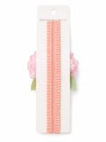 pretmybaby infant headband with a pastel pink layered flower and delicate green lace leaves on a soft elastic band