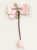 pretmybaby pastel pink organza tulip hairclip on a bow with a dangling bud, perfect for special occasions.