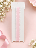 pretmybaby pastel pink baby headband with delicate ruffled lace trim on a white display card