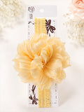pretmybaby yellow baby headband featuring a large layered fluffy flower, perfect for special occasions.