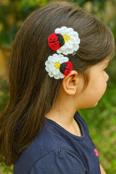 Pair of Crochet ladybug on flowers hairclip