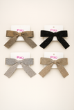 Four large jeweled Midnight Sparkle Luxe Bows by Pretmebabe in gold, black, silver, and bronze are shown on white Palü cards. Each statement bow features a buckle clip—perfect for adding elegance to any evening look.