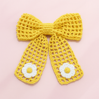 Crochet net bow with flowers