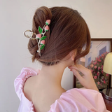 Large pink strawberry clutcher