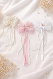 Tulle bow with gemstone and pearl trail fascinator hairclip