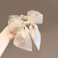 Organza and satin bow scrunchie with pearls