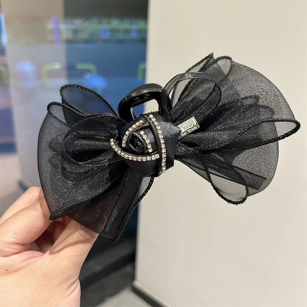 Large bow and rose clutcher