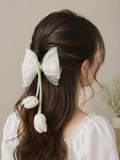Medium fascinator tulip bow with beads lining