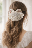 Lace bow with doiley frill