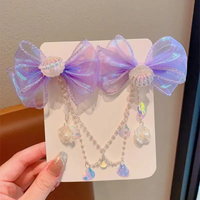 Pair of mermaid theme oyster bows