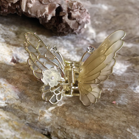 Small enamel butterfly clutcher