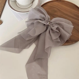 Fluffy volume bow in gossamer fabric