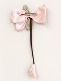 Fascinator tulip on bow with dangling bud