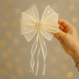 Bow fascinator hairclip with trail