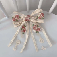 Vintage embroidered pastel bow