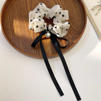 Retro black and white scrunchie with pearl and ribbon bow