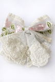 Lace bow with doiley frill