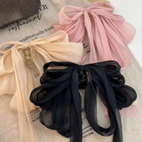 Statement multi layer bow clutcher